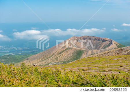 Azuma Kofuji crater over the clouds seen from Mt. Issaikyo Azuma Kofuji crater over the clouds seen from Mt. Issaikyo 90898263