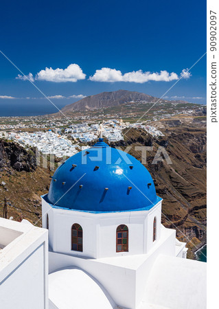 Scenery of Santorini seen from the church of the resurrection of the Lord of the Blue Dome of Imerovigli on Santorini, Greece Scenery of Santorini seen from the church of the resurrection of the Lord of the Blue Dome of Imerovigli on Santorini, Greece 90902097