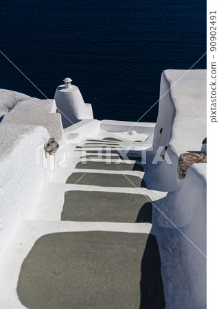 White cityscape of Oia on Santorini, Greece White cityscape of Oia on Santorini, Greece 90902491