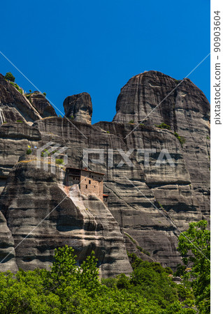 Holy Monastery of St. Nicholas Anapahusas on a rocky mountain on the precipice of Meteora, Greece Holy Monastery of St. Nicholas Anapahusas on a rocky mountain on the precipice of Meteora, Greece 90903604