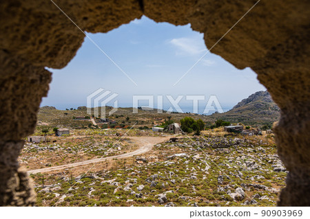 The Aegean Sea seen from Archangelos Castle in Archangelos, Rhodes, Greece. 90903969
