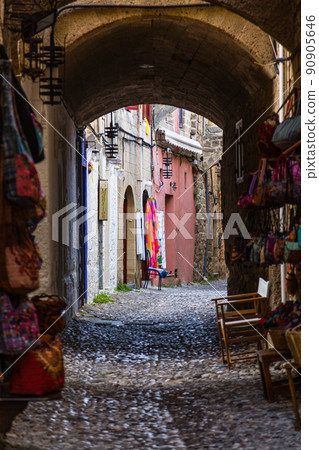 Street stalls in the back alleys of the old town of Rhodes, Greece 90905646