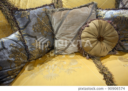 beautiful decorative pillows on sofa, close-up 90906574