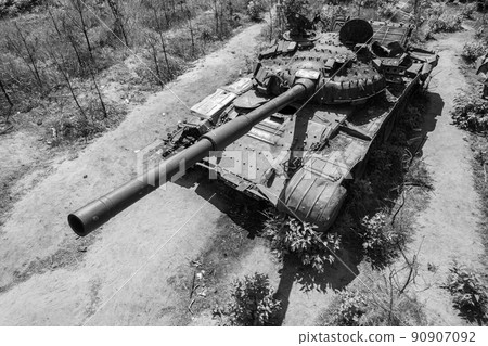 Destroyed military equipment during the war in Ukraine, black and white photo Destroyed military equipment during the war in Ukraine, black and white photo 90907092