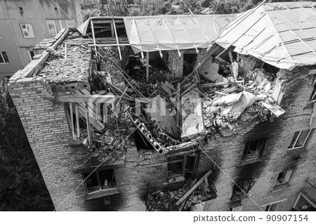 War in Ukraine - destroyed building in Makariv, black and white photo War in Ukraine - destroyed building in Makariv, black and white photo 90907154