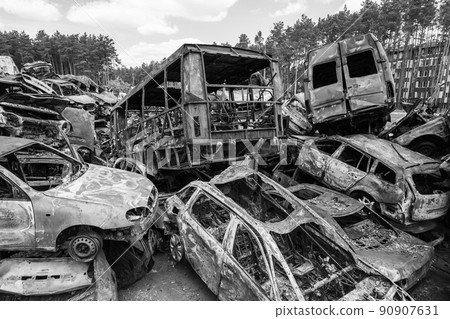 War in Ukraine: a dump of shot and burned cars in Irpin, Bucha district, black and white War in Ukraine: a dump of shot and burned cars in Irpin, Bucha district, black and white 90907631