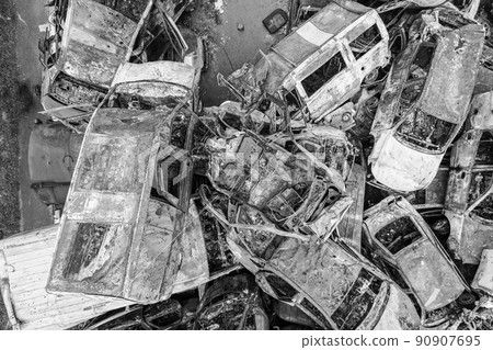 War in Ukraine: a dump of shot and burned cars in Irpin, Bucha district, black and white War in Ukraine: a dump of shot and burned cars in Irpin, Bucha district, black and white 90907695