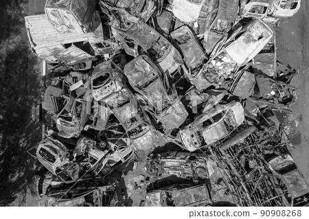 War in Ukraine: a dump of shot and burned cars in Irpin, Bucha district, black and white War in Ukraine: a dump of shot and burned cars in Irpin, Bucha district, black and white 90908268