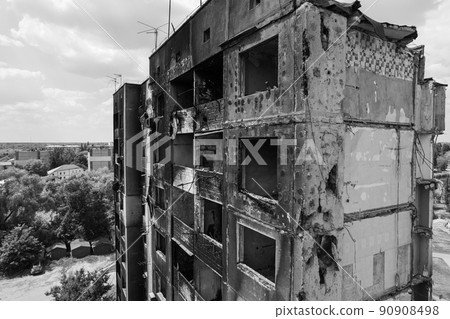 War in Ukraine - destroyed building in Borodyanka, black and white photo War in Ukraine - destroyed building in Borodyanka, black and white photo 90908498