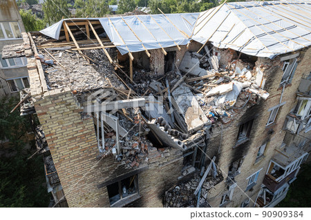 War-torn building in the city of Makariv, Ukraine War-torn building in the city of Makariv, Ukraine 90909384