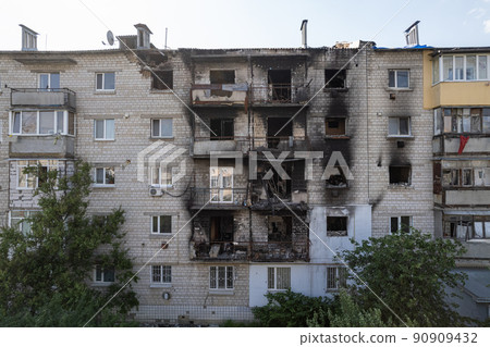 War-torn building in the city of Makariv, Ukraine War-torn building in the city of Makariv, Ukraine 90909432