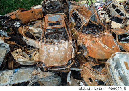 War in Ukraine: a dump of shot and burned cars in Irpin, Bucha district War in Ukraine: a dump of shot and burned cars in Irpin, Bucha district 90909948