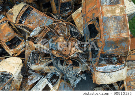 War in Ukraine: a dump of shot and burned cars in Irpin, Bucha district War in Ukraine: a dump of shot and burned cars in Irpin, Bucha district 90910185