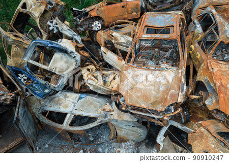 War in Ukraine: a dump of shot and burned cars in Irpin, Bucha district War in Ukraine: a dump of shot and burned cars in Irpin, Bucha district 90910247