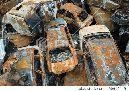 War in Ukraine: a dump of shot and burned cars in Irpin, Bucha district War in Ukraine: a dump of shot and burned cars in Irpin, Bucha district 90910449