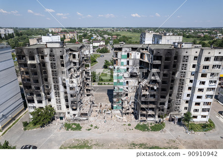 Residential building destroyed by the war in Ukraine 90910942