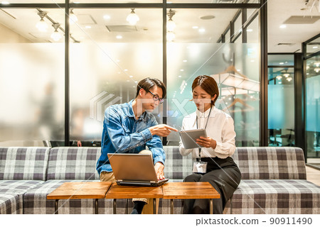 Business person working in a design office 90911490