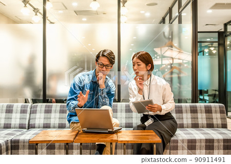 Business person working in a design office 90911491