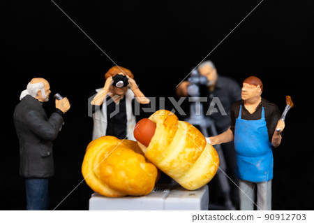 Miniature people Chefs is preparing a bakery in The studio Miniature people Chefs is preparing a bakery in The studio 90912703