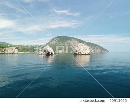 GURZUF, CRIMEA - Aerial Panoramic view on Gurzuf bay with Bear mountain Ayu-Dag and rocks Adalary, Artek - oldest children vacation camp. Yalta region, the South coast of Crimea peninsula GURZUF, CRIMEA - Aerial Panoramic view on Gurzuf bay with Bear mountain Ayu-Dag and rocks Adalary, Artek - oldest children vacation camp. Yalta region, the South coast of Crimea peninsula 90913023