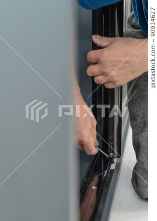 Installation of a case by means of the screw, the detailed plan of work of the master with the hexagonal screw. Installation of a case by means of the screw, the detailed plan of work of the master with the hexagonal screw. 90914627