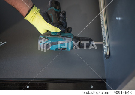 Screwing of the sliding mechanism in a case, the sliding mechanism in a case for a drawer. 90914648