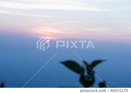 The sun rises in the morning with a beautiful orange light. The sun rises in the morning with a beautiful orange light. 90915279