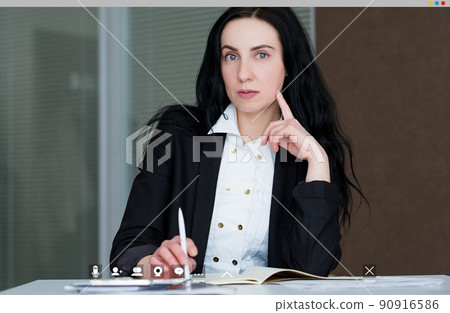 Virtual conference. Thoughtful woman. Screen mockup. Puzzled elegant lady interested on webinar in light room interior. Virtual conference. Thoughtful woman. Screen mockup. Puzzled elegant lady interested on webinar in light room interior. 90916586