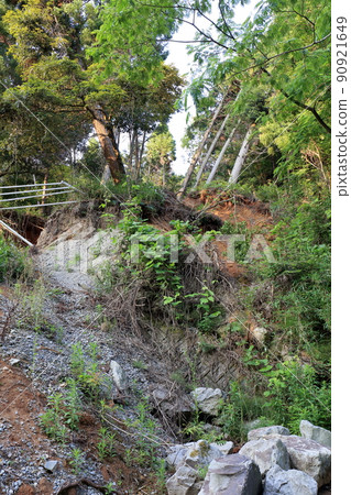 Roads completely closed due to landslides caused by natural disasters Roads completely closed due to landslides caused by natural disasters 90921649