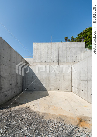 Well-maintained concrete retaining wall for condominiums 90926289