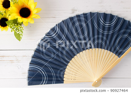 Summer image material | Sunflower and dark blue fan Summer image material | Sunflower and dark blue fan 90927464
