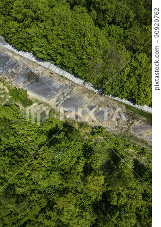 Aerial view of Toya Nishiyama foot crater (faulted road) Aerial view of Toya Nishiyama foot crater (faulted road) 90929762