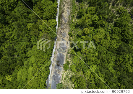 Aerial view of Toya Nishiyama foot crater (faulted road) Aerial view of Toya Nishiyama foot crater (faulted road) 90929763