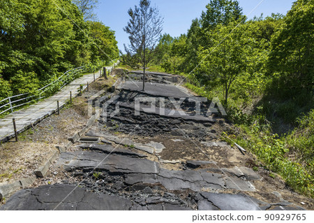 Aerial view of Toya Nishiyama foot crater (faulted road) Aerial view of Toya Nishiyama foot crater (faulted road) 90929765