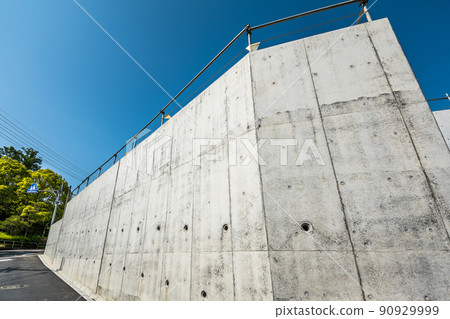 Well-maintained concrete retaining wall in a residential area for sale 90929999