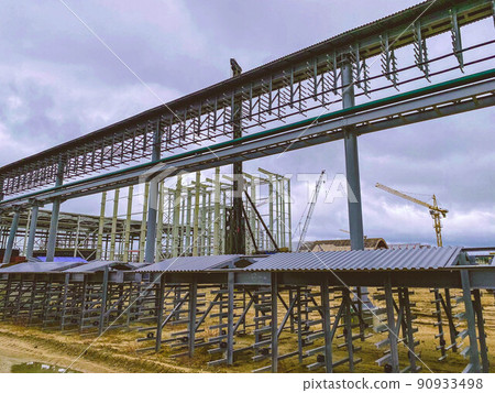 gas pipeline at a construction site. narrow pipes filled with gas carry resources through pipes to the delivery point. useful gas 90933498