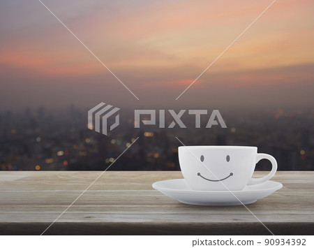 White coffee cup with smile face shape White coffee cup with smile face shape 90934392