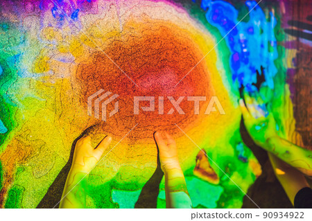 The levels of the heights of the mountains on a map made of sand 90934922