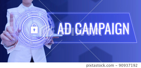Hand writing sign Ad Campaign. Concept meaning promotion of specific product or service through internet Businessman in suit holding open palm symbolizing successful teamwork. Hand writing sign Ad Campaign. Concept meaning promotion of specific product or service through internet Businessman in suit holding open palm symbolizing successful teamwork. 90937192