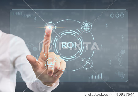 Concept ROI or Return on investment. Business acronym. The hand touches the holographic display with icons. Concept ROI or Return on investment. Business acronym. The hand touches the holographic display with icons. 90937644