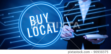 Conceptual caption Buy Local. Internet Concept Patronizing products that isoriginaly made originaly or native Lady in suit holding pen symbolizing successful teamwork accomplishments. 90938375