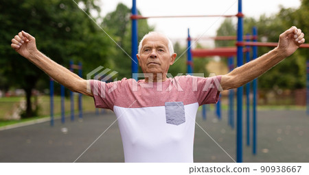 Senior man doing warming up exercises Senior man doing warming up exercises 90938667