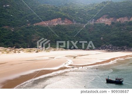 Aerial view of beautiful landscape, tourism boats, and people swimming on the sea, Vietnam. Travel concept Aerial view of beautiful landscape, tourism boats, and people swimming on the sea, Vietnam. Travel concept 90938687
