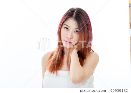 Chinese American woman wearing a white towel, beauty concept Chinese American woman wearing a white towel, beauty concept 90939182