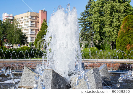 Splashes of water in fountain in summer Splashes of water in fountain in summer 90939290
