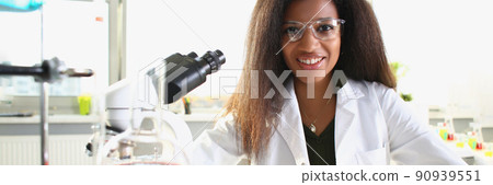 Black young woman biologist in the laboratory, close-up Black young woman biologist in the laboratory, close-up 90939551