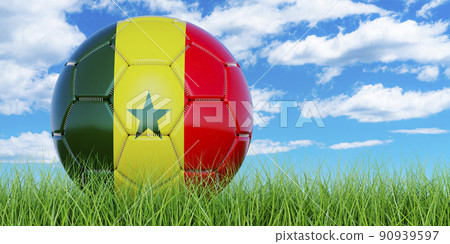 Soccer ball with Senegalese flag on the green grass against blue sky, 3D rendering 90939597