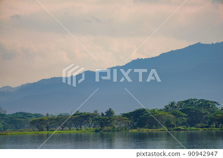 Mountain and Lake with the unique cloud in the Phayao lake, province of the North of Thailand. 90942947