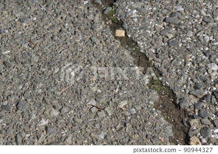 Cracked asphalt Cracked asphalt 90944327