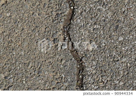 Cracked asphalt 90944334